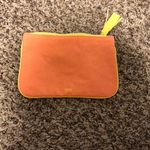 Orange and yellow makeup bag